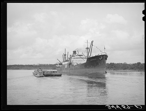Freighter leaving port of Houston, Texas