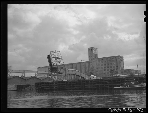 Flour mill and coal loading dock. Port of Houston, Texas