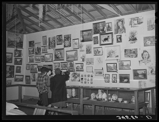 Women looking at art exhibit at Gonzales County Fair. Gonzales, Texas