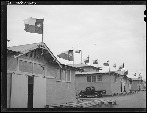 Exterior of exhibit halls on a dreary Saturday morning before the gates were open to the public. Gonzales, Texas