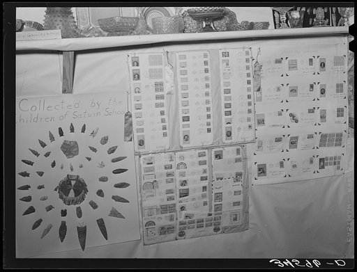 Stamp and Indian arrowhead collections of schoolchildren exhibited at the Gonzales County Fair, Texas