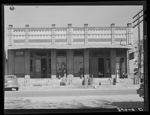 Untitled photo, possibly related to: Post office and business establishments on the main street of Waelder, Texas