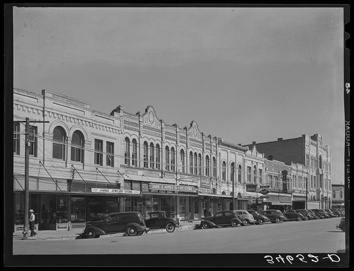 Scene in business section of Gonzales, Texas