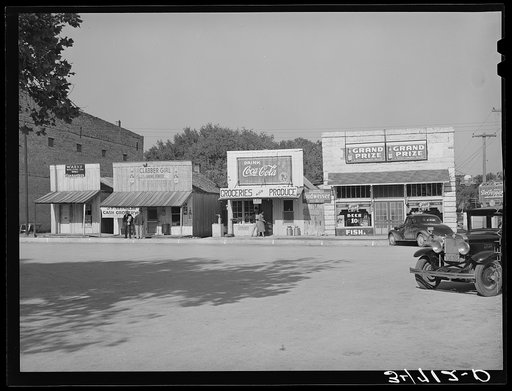 Store buildings on square. Glen Rose, Texas