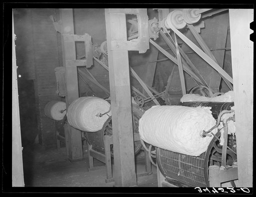 Untitled photo, possibly related to: Linters, that cotton which clings to the seed, is removed and then formed into bats. Linters is of particular value in chemical industries because of its cellulosic content. Cotton seed oil mill. McLennan County, Texas