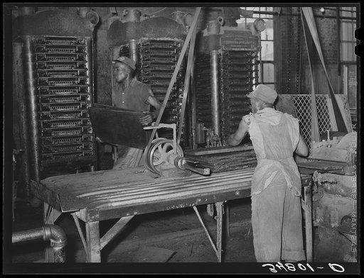 Action around the hydraulic presses. Cotton seed oil mill. McLennan County, Texas