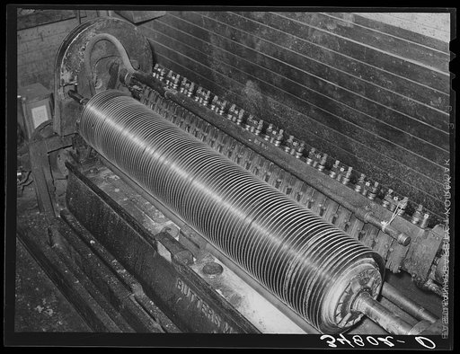 Steel milled roll which separates linters from the cotton seed. Cotton seed oil mill. McLennan County, Texas