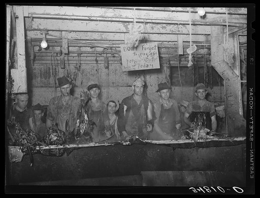 Scalding turkeys two at a time. Cooperative poultry house, Brownwood, Texas. Sign refers to health certificate