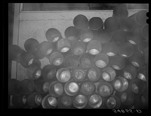 Stack of ice cream cans. Creamery, San Angelo, Texas