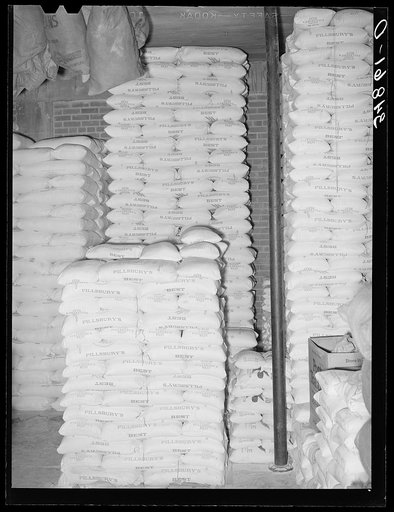 Stacks of flour in storage. Wholesale grocery, San Angelo, Texas