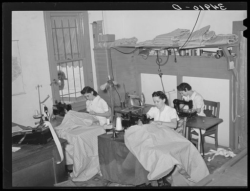 Sewing mattress ticking. Mattress factory. San Angelo, Texas