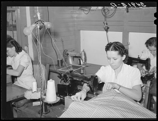 Sewing ticking for mattress. Mattress factory. San Angelo, Texas