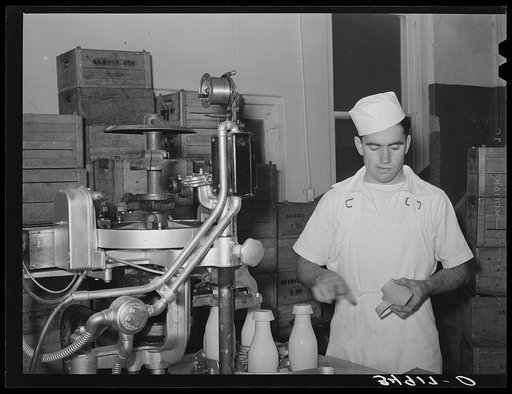 Capping milk bottles. Creamery, San Angelo, Texas