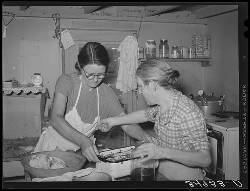 Activity in kitchen of eating house at auction. San Angelo, Texas