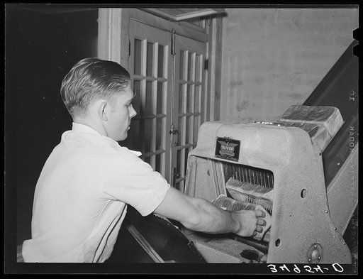 Slicing bread at bakery. San Angelo, Texas