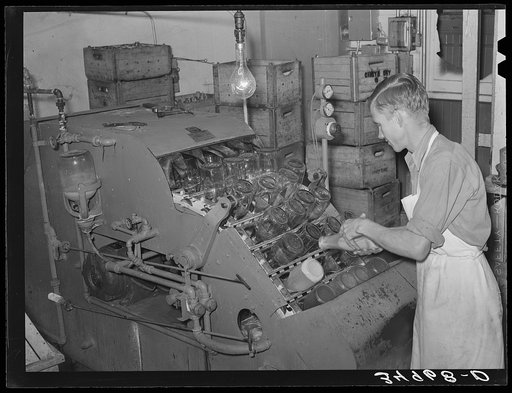 Washing bottles at creamery. San Angelo, Texas
