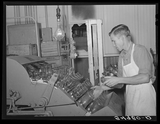 Untitled photo, possibly related to: Washing bottles at creamery. San Angelo, Texas