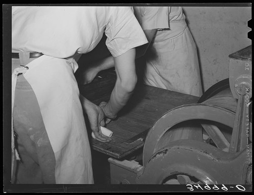 Untitled photo, possibly related to: Preparing rolls for baking. Bakery, San Angelo, Texas