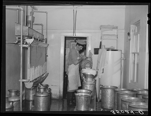 Room where milk is strained and cooled. Large dairy in Tom Green County, Texas