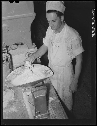 Weighing out the shortening. Bakery, San Angelo, Texas