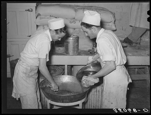 Bakers making filling for pies. San Angelo, Texas