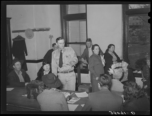 Meeting of FSA (Farm Security Administration) clients with supervisor, making out farm and home plans. Mason, Texas