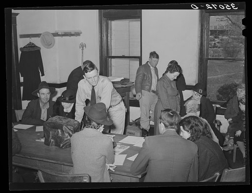 Meeting of FSA (Farm Security Administration) clients with supervisor, making out farm and home plans. Mason, Texas