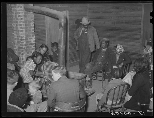 Members of UCAPAWA (United Cannery, Agricultural, Packing, and Allied Workers of America) agricultural workers union talking before meeting opens. Tabor, Creek County, Oklahoma