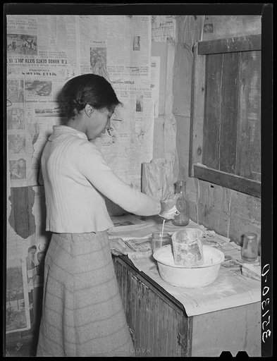 Wife of Pomp Hall, Negro tenant farmer, making biscuits for breakfast. Creek County, Oklahoma. See general caption number 23