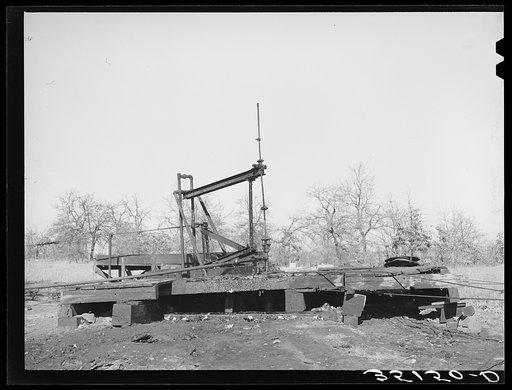 Oil well on the pump. Slick, Oklahoma