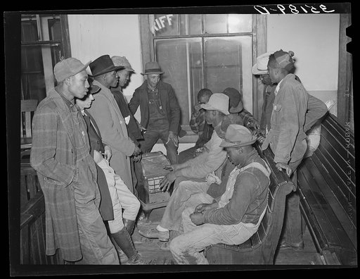 Tenant farmers and sharecroppers, members of UCAPAWA (United Cannery, Agricultural, Packing, and Allied Workers of America), at meeting in Bristow, Oklahoma