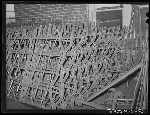 Spike-tooth harrow parts. Farm equipment warehouse, Oklahoma City, Oklahoma