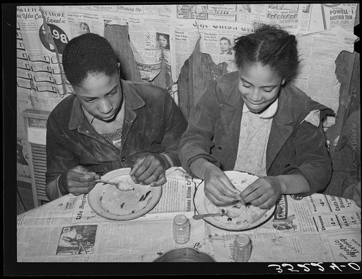 Children of Pomp Hall, Negro tenant farmer, pleased with their supper of corn bread and gravy. Creek County, Oklahoma. See general caption number 23
