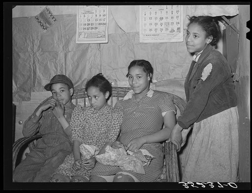 Untitled photo, possibly related to: Two daughters of Pomp Hall, Negro tenant farmer, making patchwork cushions for chairs. Creek County, Oklahoma. See general caption number 23