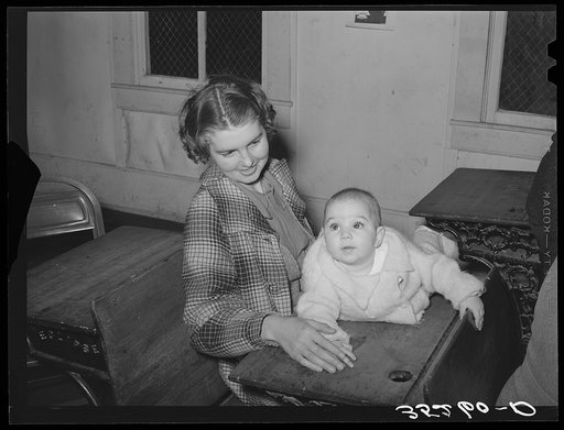 Mother and child at pie supper in Muskogee County, Oklahoma. See general caption number 24