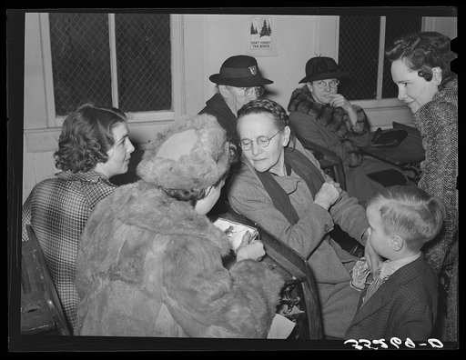 Women talking at pie supper in school house at Muskogee County, Oklahoma. See general caption number 24