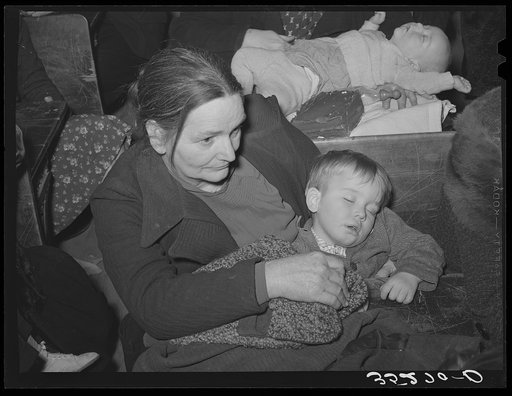 Farm woman and son at pie supper in Muskogee County, Oklahoma. See general caption number 24