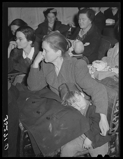 Farm woman and son at pie supper at school house in Muskogee County, Oklahoma. See general caption number 24