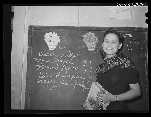 School teacher at rural school, winner of the prettiest girl contest at the pie supper. Muskogee County, Oklahoma. See general caption number 24