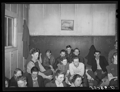 Farmers at pie supper listening to the auctioneer. Muskogee County, Oklahoma. See general caption number 24