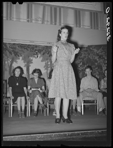Girl reciting her piece at Americanization program at high school. Eufaula, Oklahoma
