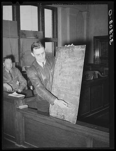 County agent comparing the cotton south and Iowa and pointing out the importance of livestock on the farm. Eufaula, Oklahoma