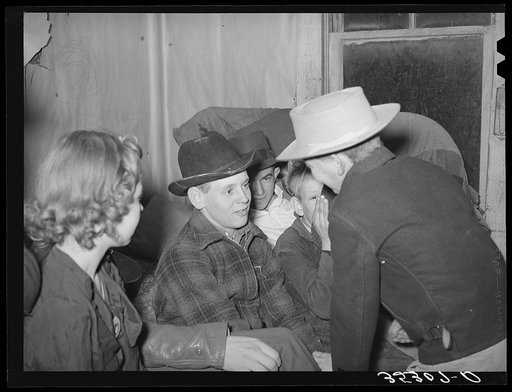 Playing "Cross Questions and Silly Answers" at play party in McIntosh County, Oklahoma. See general captions 26