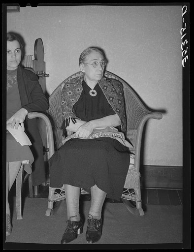 Elderly farm woman at meeting of home demonstration club. McIntosh County, Oklahoma