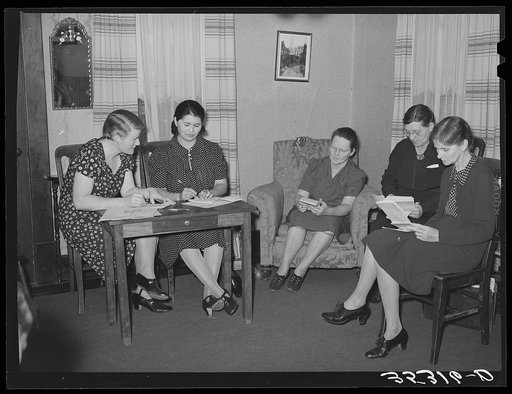 Members of home demonstration club enumerating repairs and improvements made to their homes, thus receiving certain number of points. McIntosh County, Oklahoma