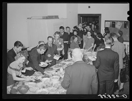 Jaycee members and their wives at buffet supper at the high school. Eufaula, Oklahoma. See general caption number 25