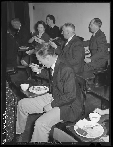 Man eating pie at the buffet supper of the Jaycees at Eufaula, Oklahoma. See general caption number 25