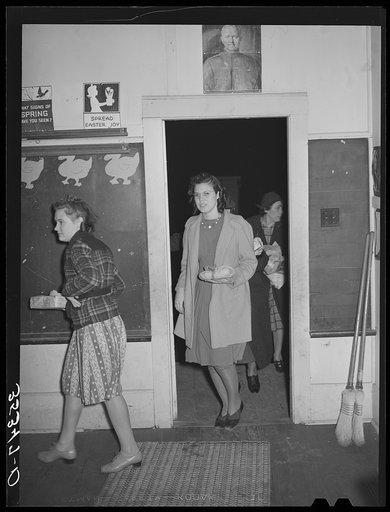 Rural young women arriving at pie supper with their pies which will be auctioned off. Muskogee County, Oklahoma. See general caption number 24