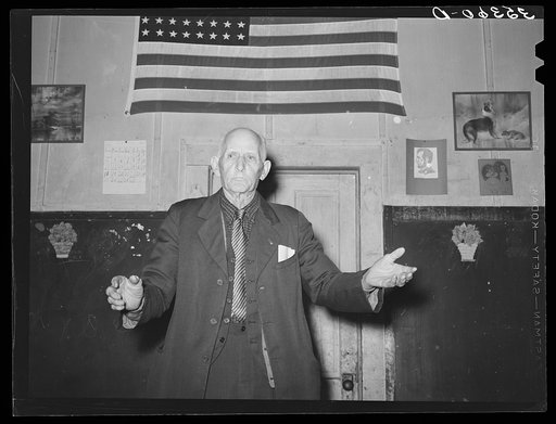 Colonel Lilly, auctioneer at pie supper. McIntosh County, Oklahoma. See general caption number 24