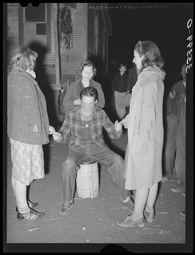 Playing the game "Fishing for love" at play party in McIntosh County, Oklahoma. See general caption number 26